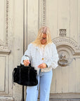 VESTE À POIS BLANCHE