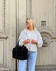 VESTE À POIS BLANCHE