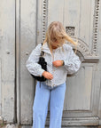 VESTE À POIS BLANCHE