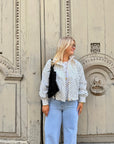 VESTE À POIS BLANCHE