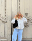 VESTE À POIS BLANCHE